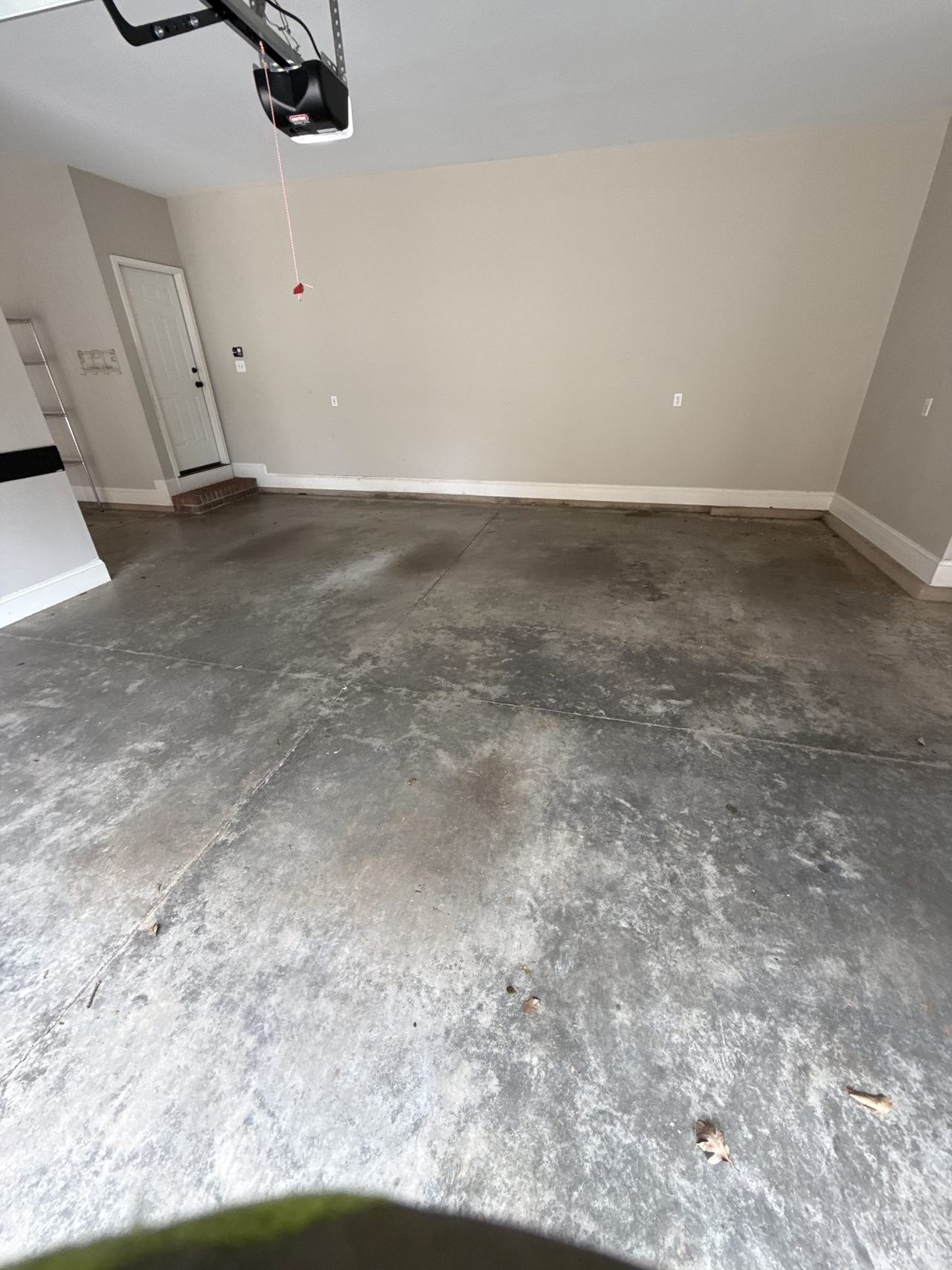 Empty clean garage after Mount N Muscle junk removal in Charlotte NC