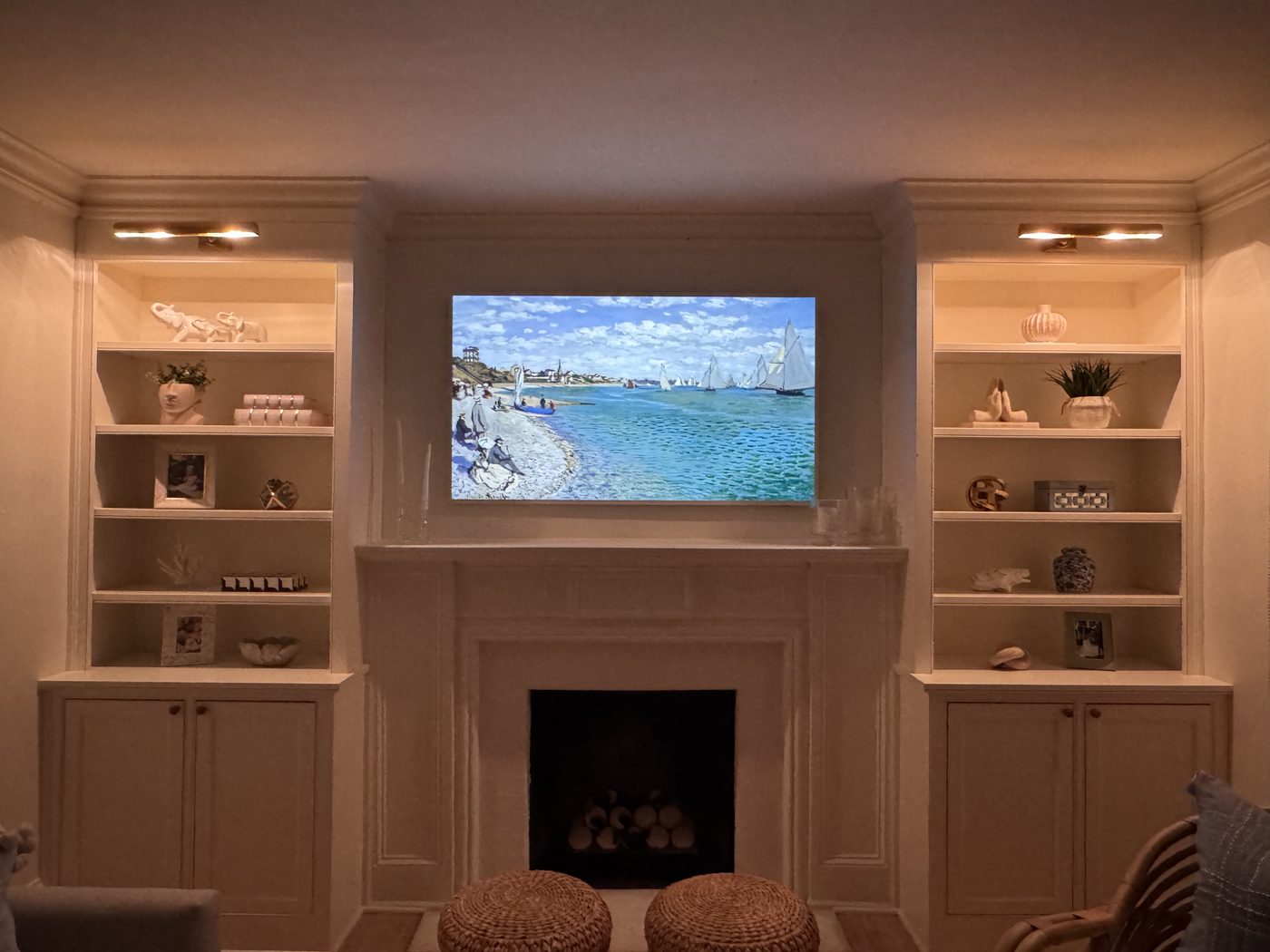 Professional TV mounting above fireplace luxury home Charlotte NC Mount N Muscle