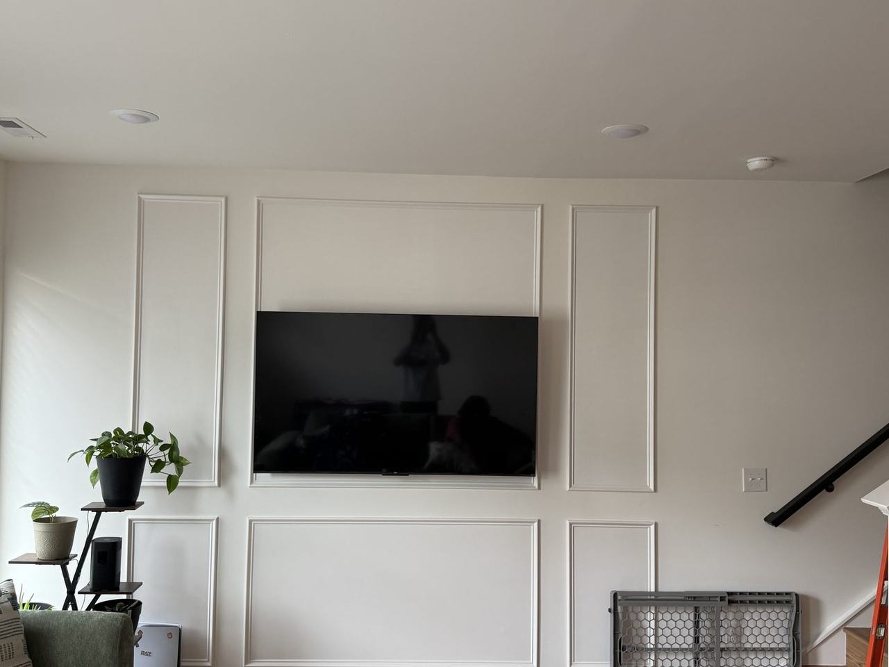 TV mounted on wainscoting accent wall in Charlotte NC
